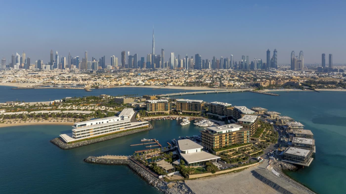 Jumeirah Bay island from the air with the Dubai skyline behind